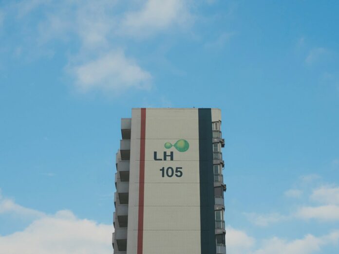 a tall building with a sky background